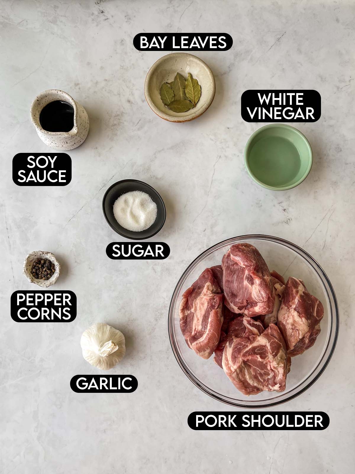 Labeled ingredients for Instant Pot Pork Adobo.