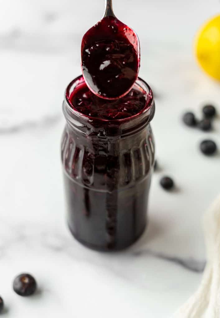 Homemade blueberry jam in a car
