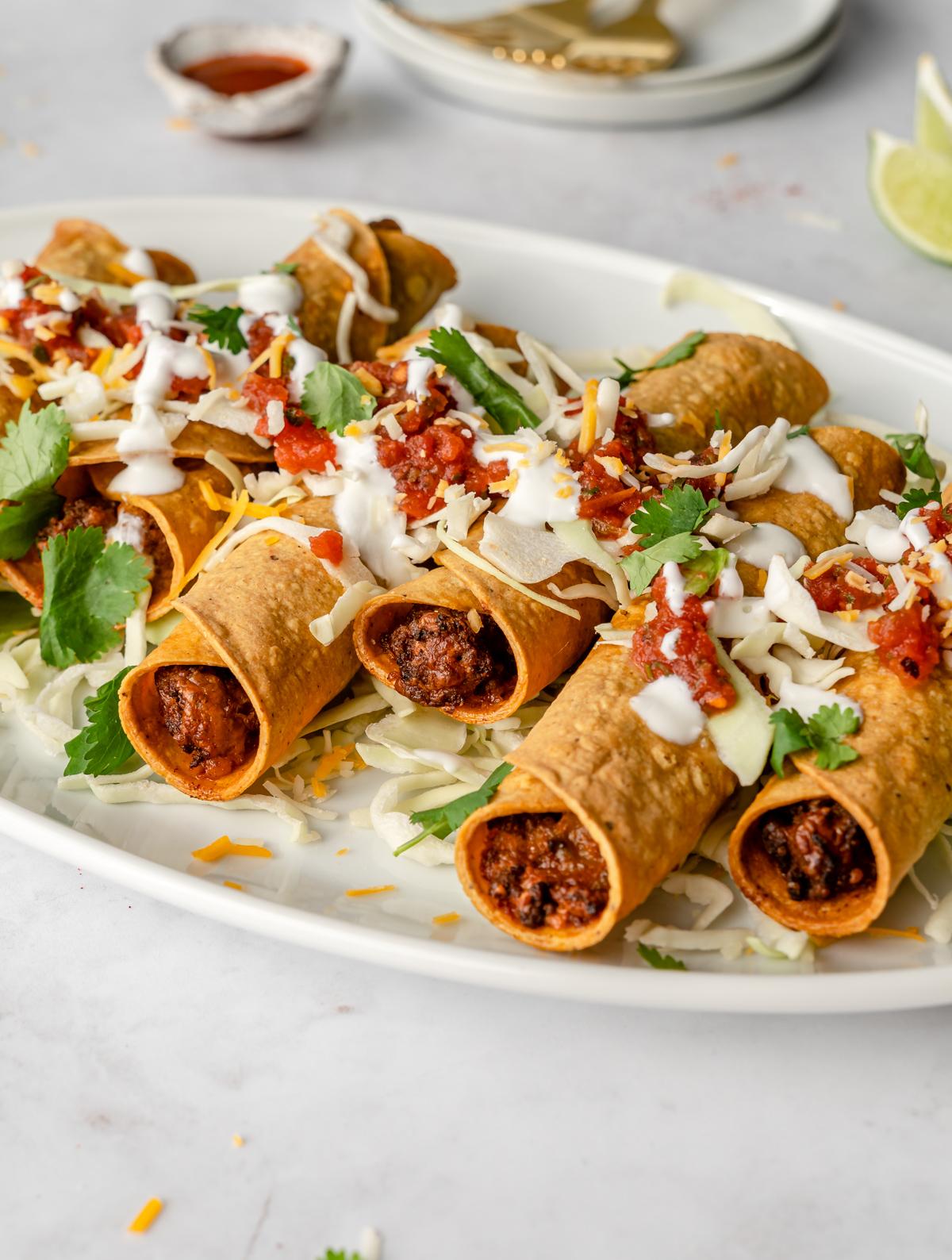 Beef taquitos on a platter