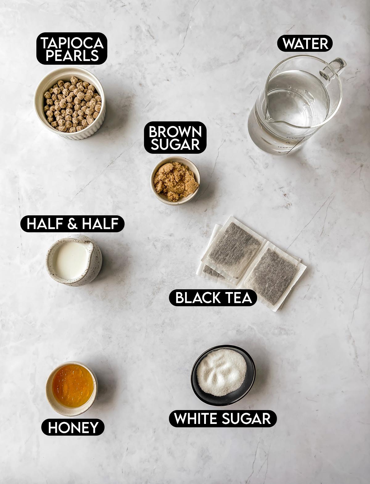 Labeled ingredients for classic milk tea boba.