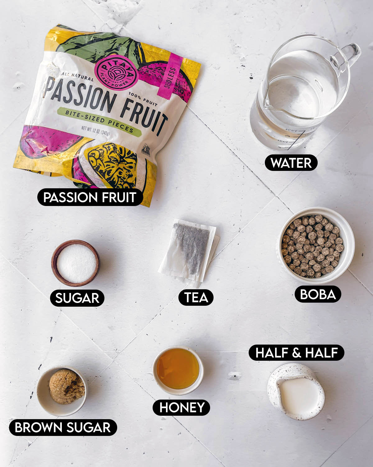 Labeled ingredients needed for passion fruit boba: passion fruit, water, sugar, tea, boba, brown sugar, honey, and half and half.